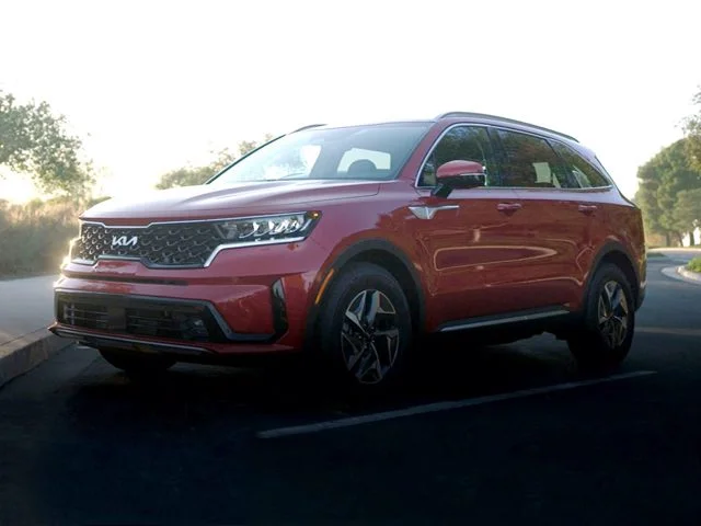 A red Kia Sorento parked outdoors